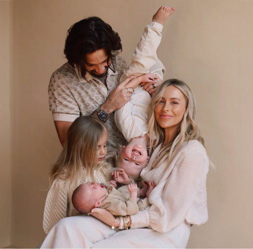 Family together with mom, dad and three kids