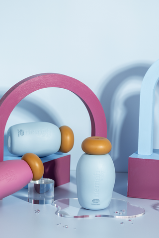 nemah baby soothing baby lotion bottle with orange cap, pastel set and pink arch prop