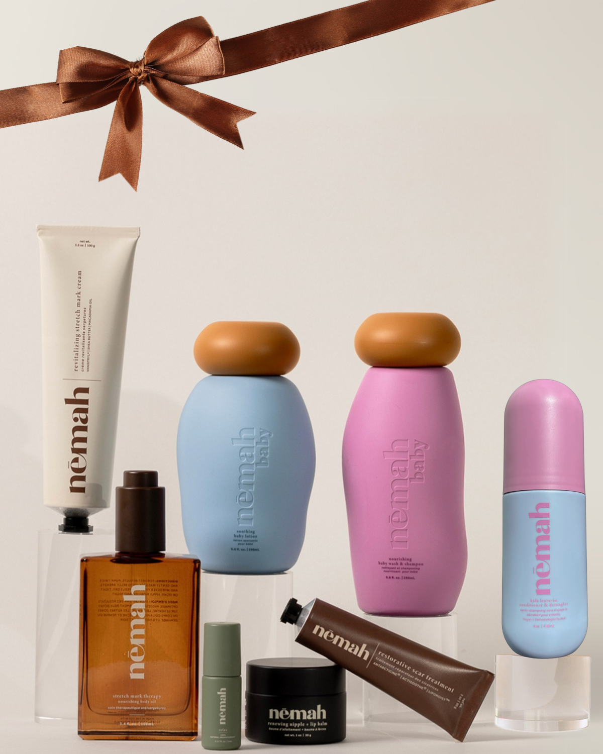 Collection of skincare products with a brown ribbon