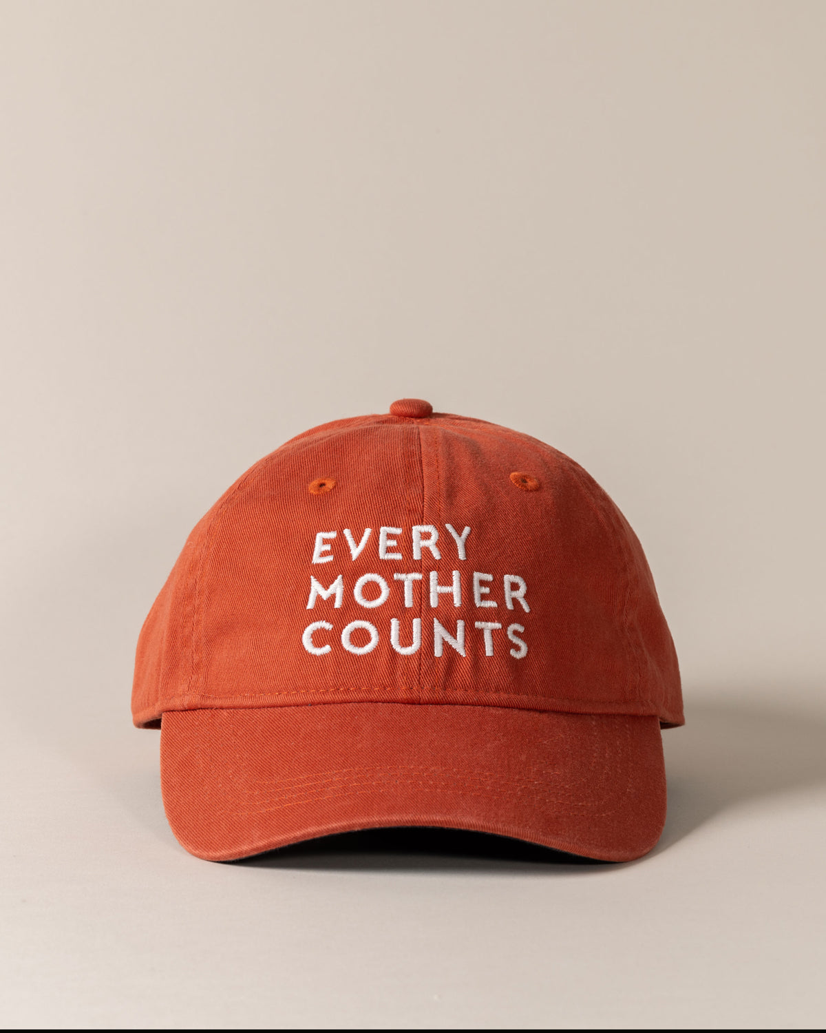 Rust-colored hat with 'Every Mother Counts' text